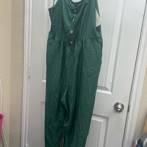 New BloomChic Solid Button Pocket Elastic Waist
Knotted Shoulder Jumpsuit 12 L - Picture 9 of 13